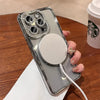 A clear glitter diamond magnetic wireless phone case with multiple camera lenses and a round lens is displayed on a wooden su