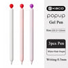 Three smooth gel pens in white, pink, and purple colors shown side by side.