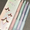 A pack of four pastel gradient gel pens with black ink in various shades and finishes.