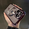 A hand holds a dark purple magnetic clear case with a plated finish for a MagSafe iPhone.
