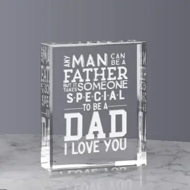 A clear glass box with engraved text that reads Man Can Be a Father But It Someone Takes Special to be a Dad I Love You