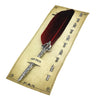 A set of retro calligraphy dip pens and a feather housed in a vintage-style gift box.