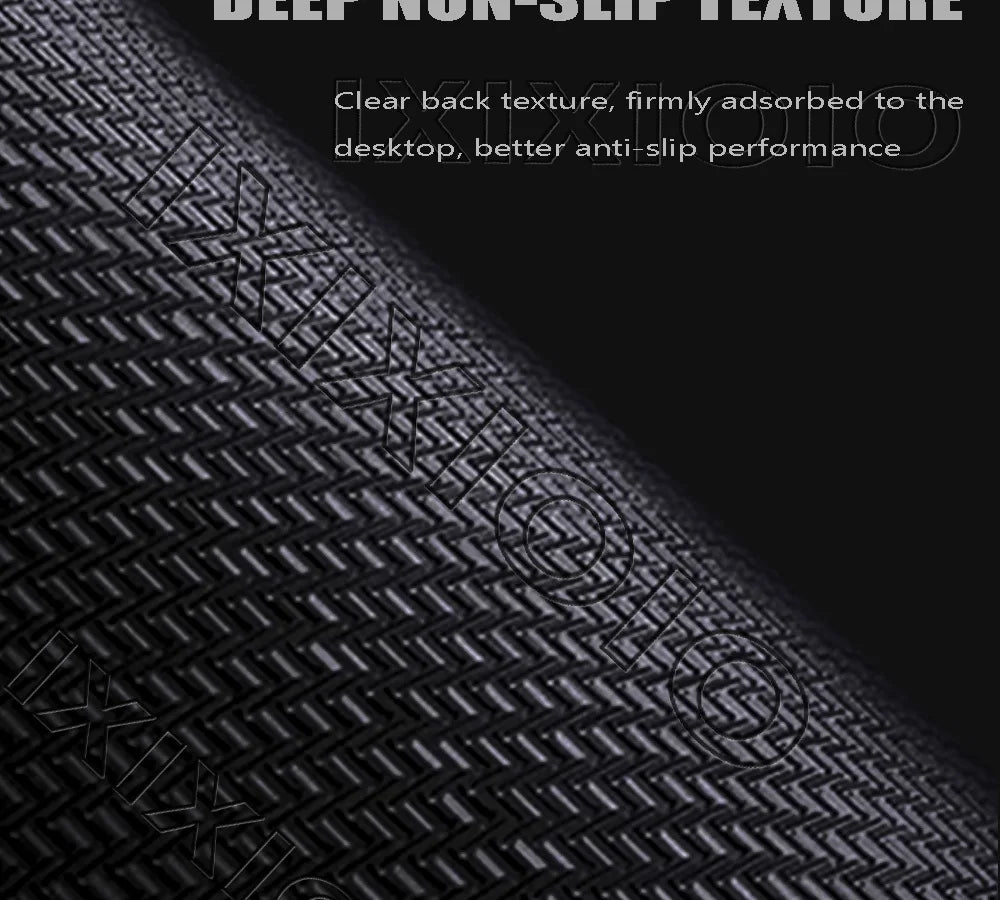 Close-up view of a dark gray non-slip textured mouse pad with a geometric pattern.