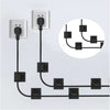 A black cable organizer kit with multiple outlets and connectors shown mounted on a wall.