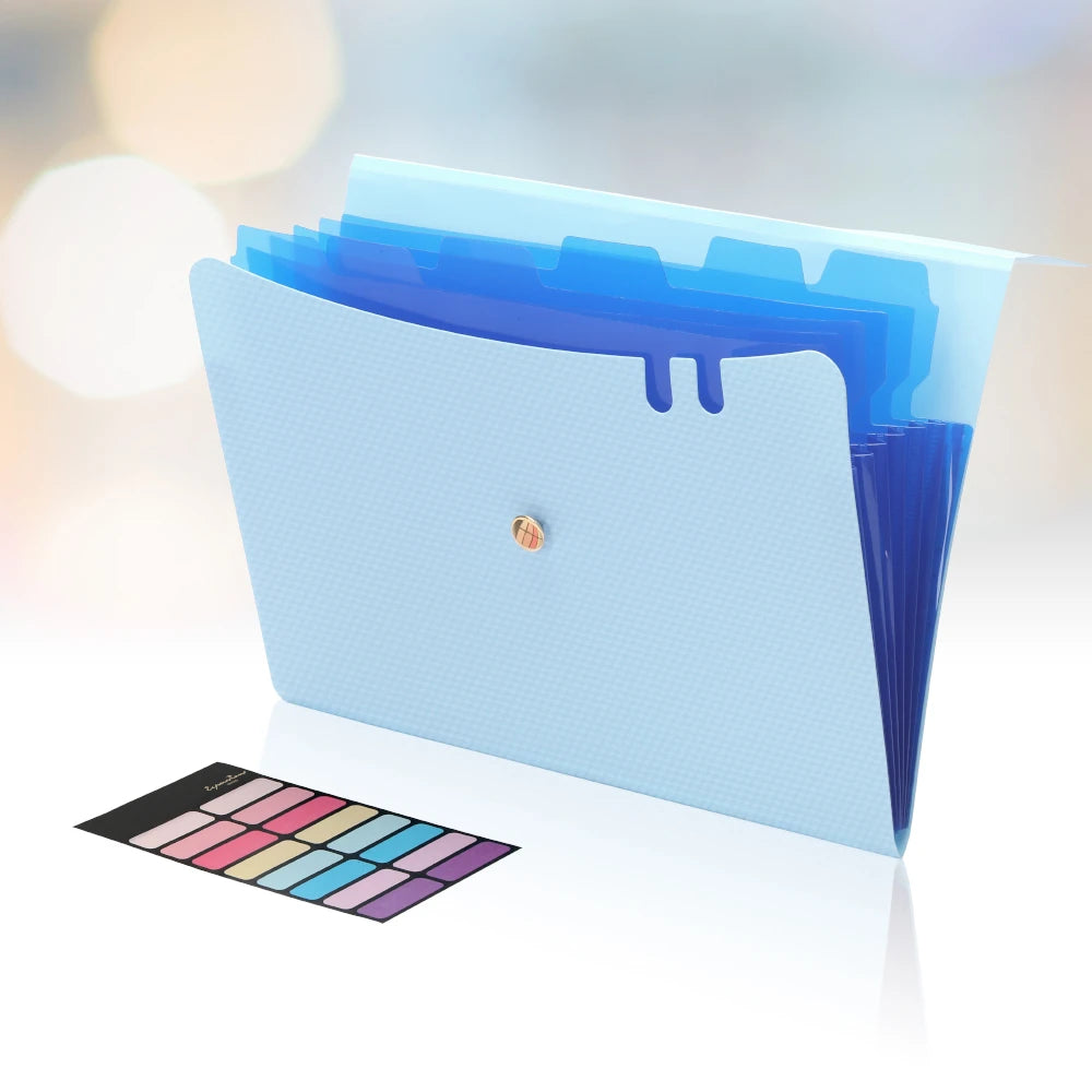 A light blue accordion file organizer with a purple color palette swatch lying next to it.