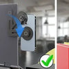 Magnetic phone holder device demonstrating attachment to a laptop and monitor.