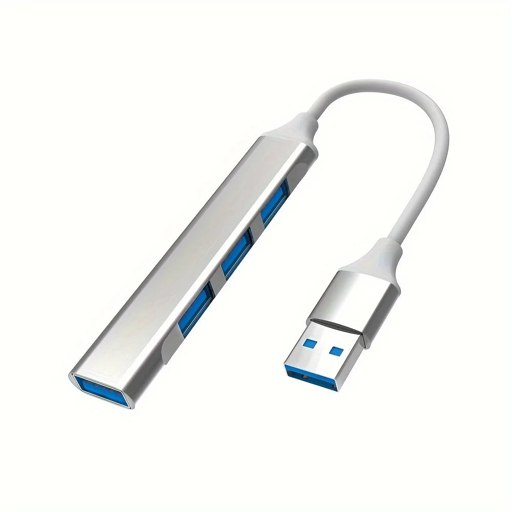 A silver USB 2.0 hub with four ports and an OTG adapter cable.
