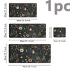 A set of three floral design mouse pads in dark green fabric with various sizes and patterns.