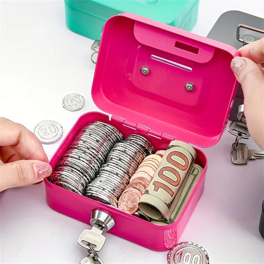 A pink steel cash box with a key lock and removable tray filled with coins and bills.