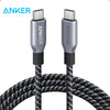 Anker Prime USB-C zu USB-C Schnellladekabel mit silbernen Steckern und schwarzem geflochtenem Draht.