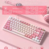 A pink mechanical keyboard with vibrant RGB backlight is shown next to various customization options and lighting effects.