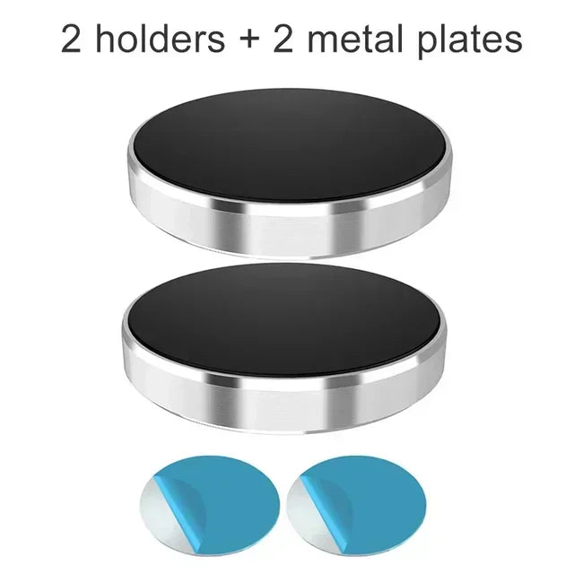 Two black and silver magnetic holders with two blue metal plates.