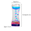 A glass hourglass timer filled with colorful liquid, showing different levels of fluid.