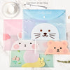 A set of four cute cartoon transparent snap bags in pink, blue, white, and green for document storage.