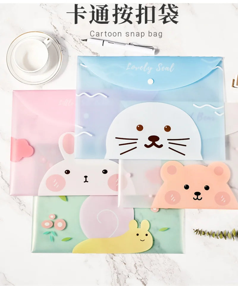 A set of four cute cartoon transparent snap bags in pink, blue, white, and green for document storage.