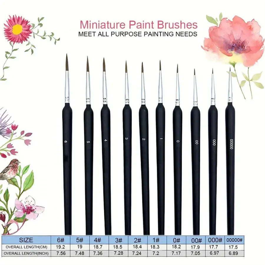 A set of miniature paint brushes in black and various sizes with pink floral accents.