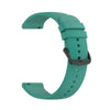 A teal silicone watch band for a smartwatch, shown in a curved shape.
