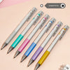 A set of colorful Pilot Juice Up Fine Point Gel Pens displayed diagonally on a light pink background.