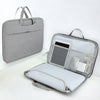 A gray universal laptop sleeve designed to protect a MacBook or PC is shown open and closed.