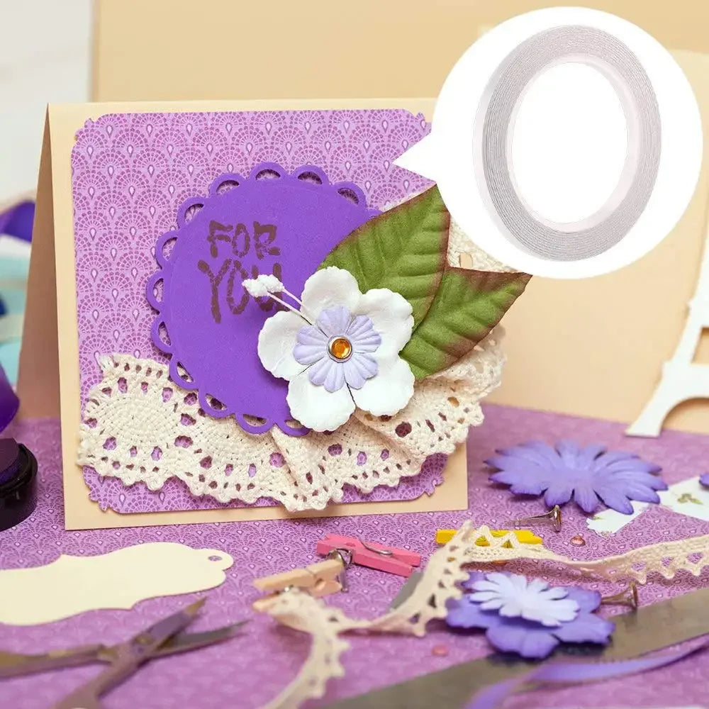 A craft adhesive tape set featuring purple and white floral elements on a card background.