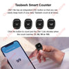 A hand holds a smartphone displaying the number 99 on a digital Zikr ring for prayer counting.