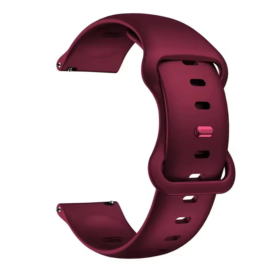 A close-up view of a deep magenta silicone watchband for an Amazfit Bip 6.