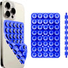 A silver smartphone is shown next to a blue silicone suction cup mount with multiple circular cups.