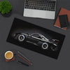 A black JDM car design gaming mouse pad featuring a detailed model of a black sports car.