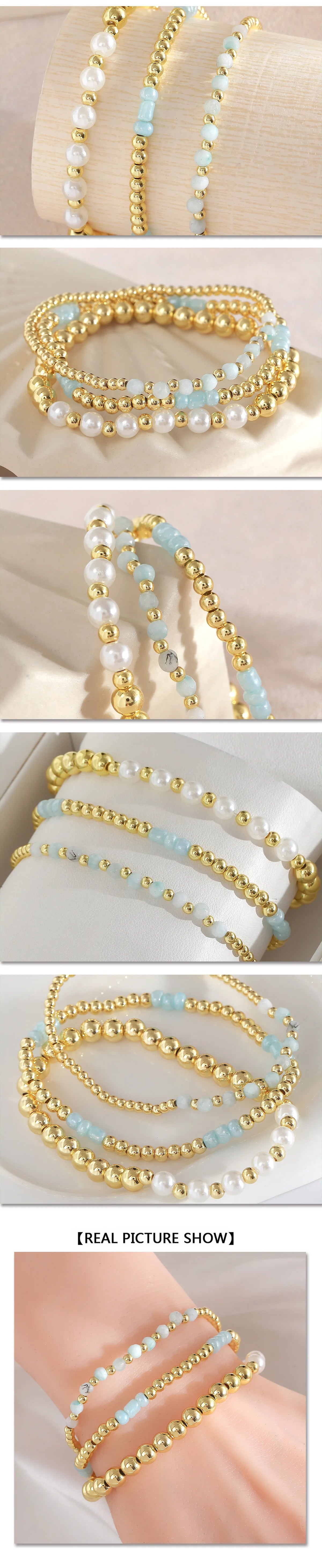 Gold-plated shell pearl beaded bracelets in various shades of white and light blue.