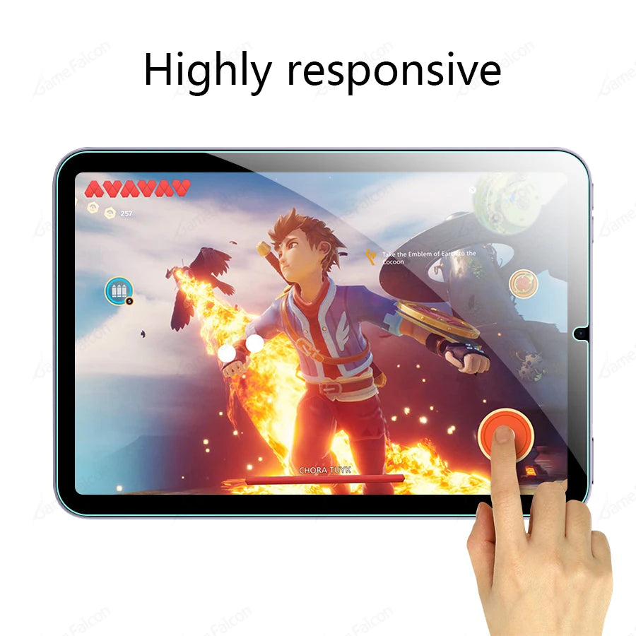 A hand touches a tablet displaying an Avatar game with a fiery background, demonstrating the highly responsive screen.