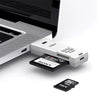 A white USB 3.0 card reader is shown next to a Sony SD card.