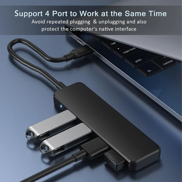 A black 4-port USB hub adapter with multiple connectors is shown next to a laptop.