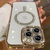 A clear magnetic wireless phone case decorated with sparkling diamonds and a silver ring design.