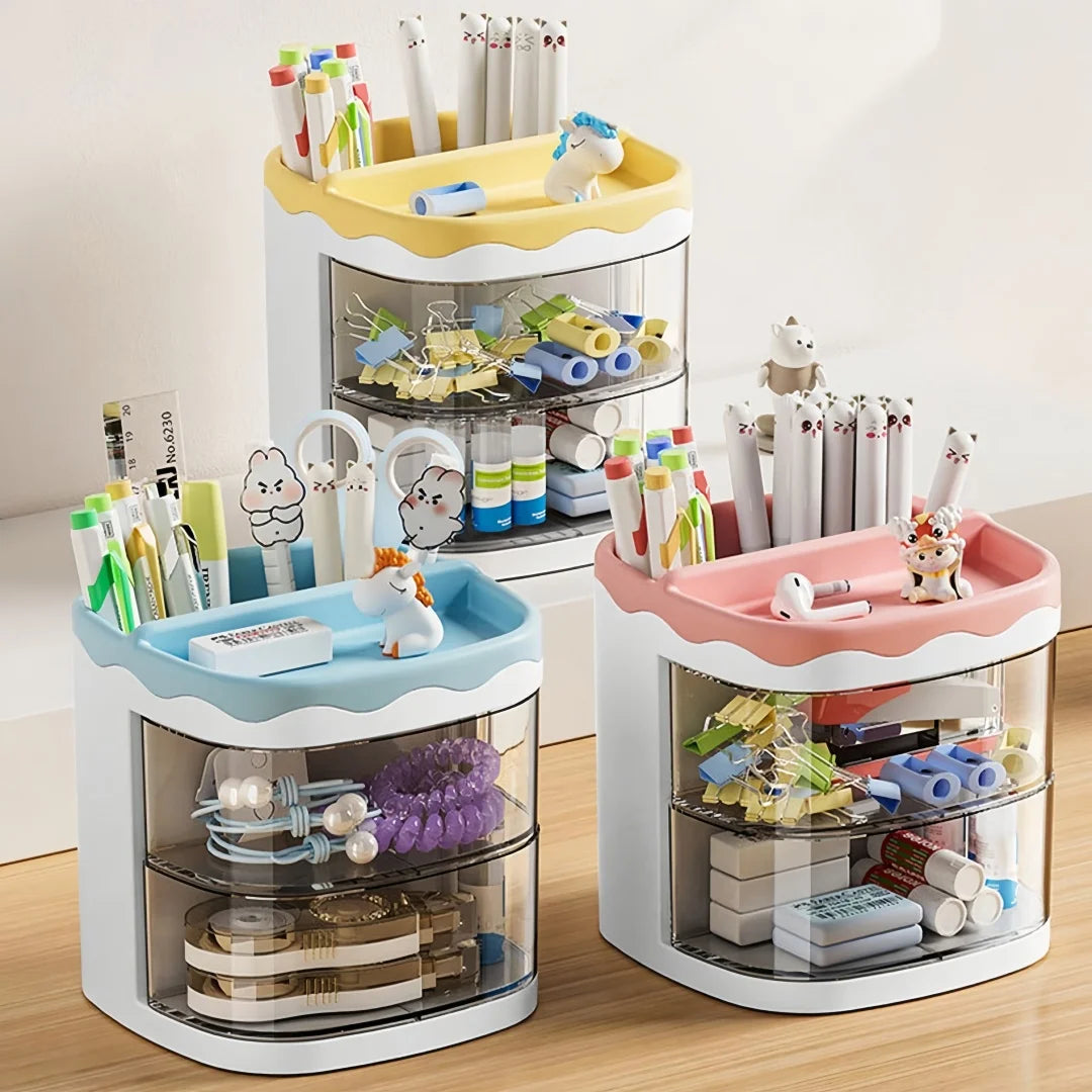 A set of clear acrylic desktop pen holders in pink and blue for office school or vanity use