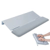An ergonomic acrylic keyboard wrist rest stand with a keyboard and a separate acrylic tray.