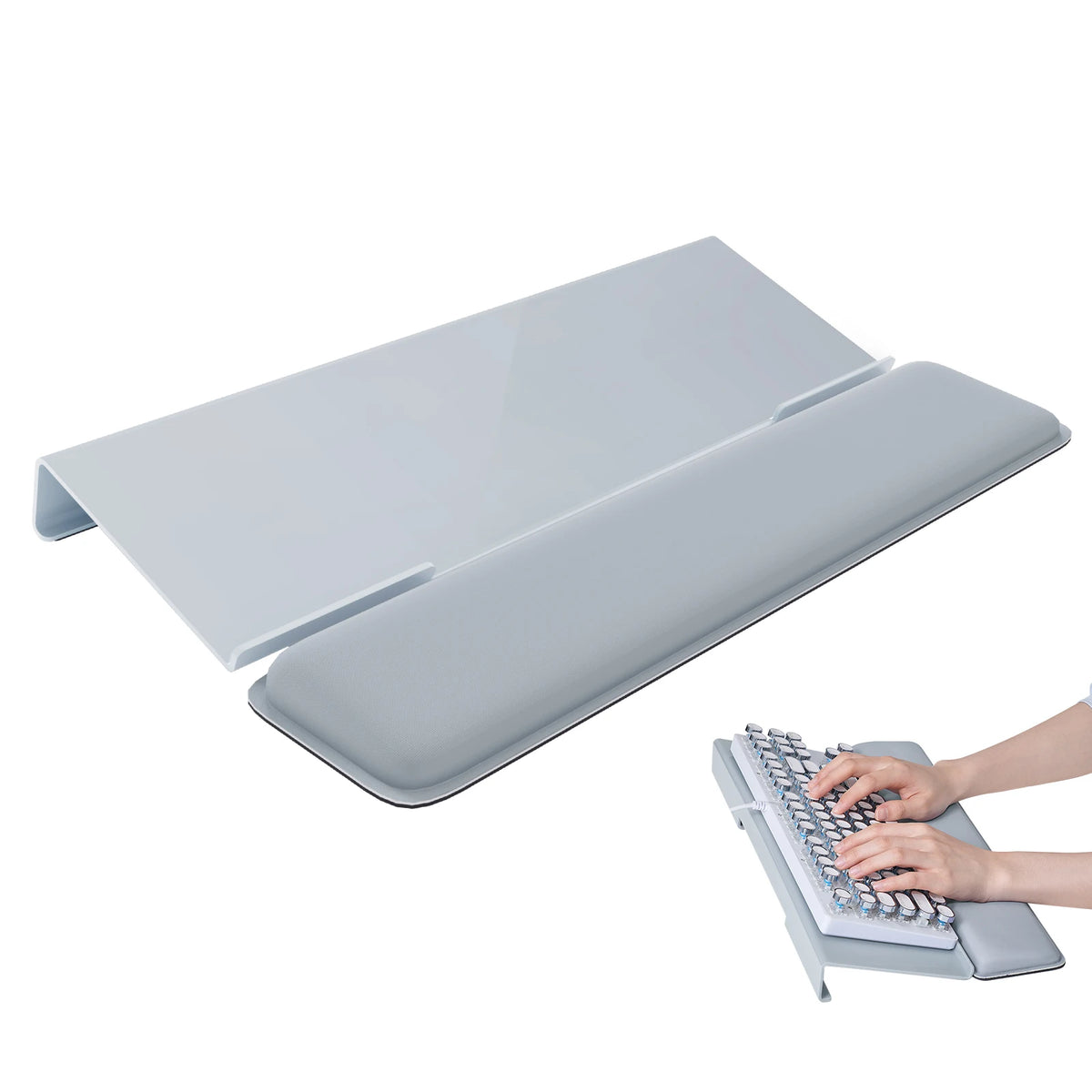 An ergonomic acrylic keyboard wrist rest stand with a keyboard and a separate acrylic tray.