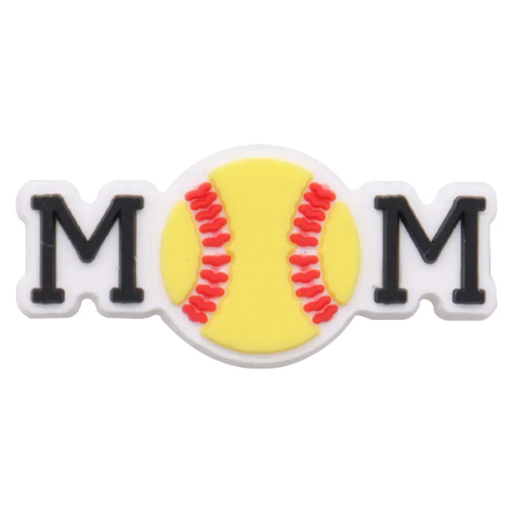 A white charm featuring the letters MOM surrounding a yellow baseball with red stitching.