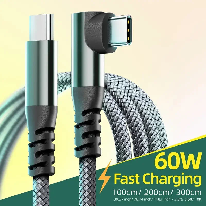 A close-up of a silver USB-C fast charging cable with a braided black jacket and a white connector tip.