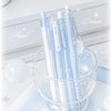 A set of four light blue Kawaii Pearl Angel gel pens in a glass bowl on a white surface.