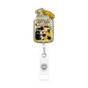 A cute retractable badge reel featuring a strawberry design with illustrations of various animals.