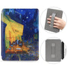 A dark blue and yellow painted cover featuring a street scene, alongside a gray leather case for a Kindle Paperwhite.