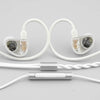 White wired in-ear headphones with coiled cables and a detachable connector.