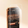 A close-up of an iPhone displaying a screen protector, highlighting the borderless vision feature.