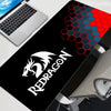 Black gaming mouse pad featuring a red and blue honeycomb pattern and a white dragon logo