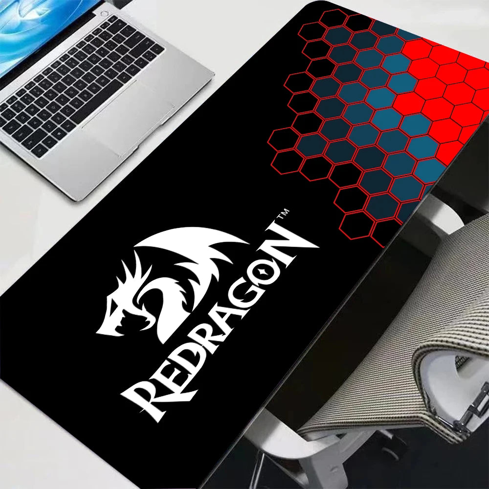Black gaming mouse pad featuring a red and blue honeycomb pattern and a white dragon logo