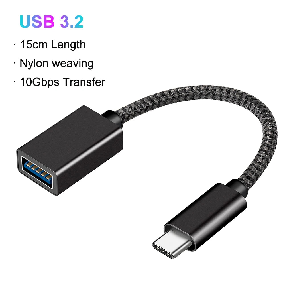 Black nylon braided USB 3.2 cable adapter connecting a USB-C connector to a USB-A plug.