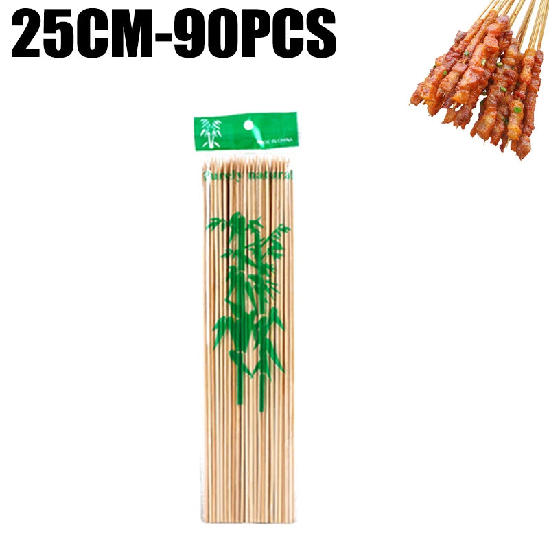 A set of natural bamboo skewers, various lengths, packaged in a green pouch.