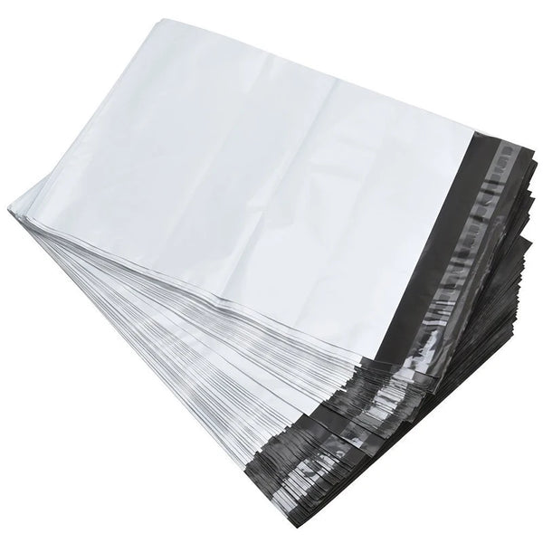 A stack of self-sealing poly mailers in white and black are shown from an angled view.
