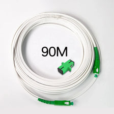Bobine de câble à fibre optique monomode de 90 mètres avec connecteurs verts.