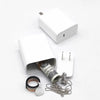 A white secret storage charger plug for valuables with a gold-colored chain and a silver pendant.